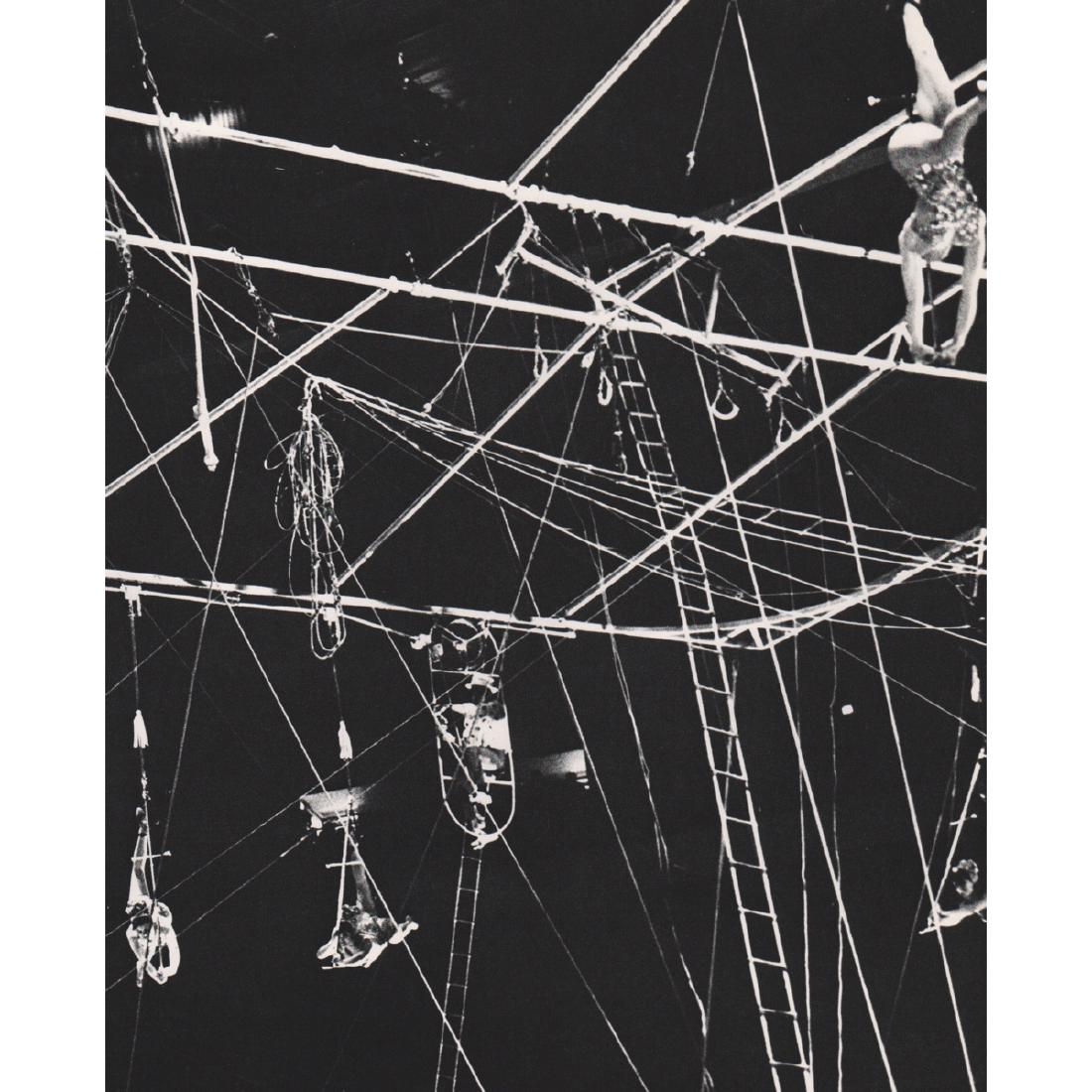 ANDRE KERTESZ - High Wire Act: Artist: ANDRE KERTESZ Print Title: High Wire Act Medium: Sheet-Fed Gravure Printing Date: 1970's Printed in Japan Image size approx. 7.5 x 9.5 inches Andre Kertesz(1894-1985) born Kertesz Andor, was a