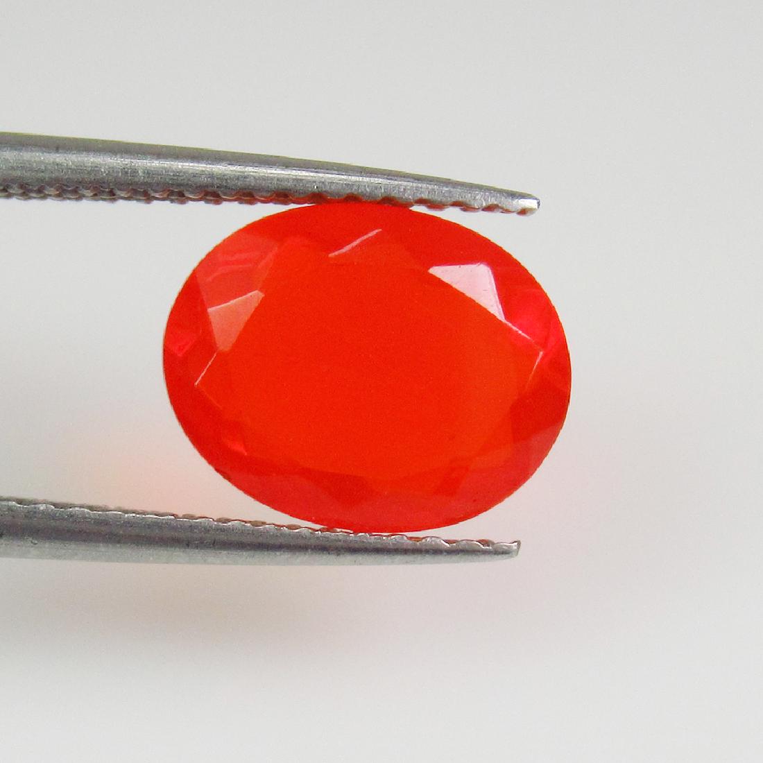 1.67 Ct Genuine Ethiopian Orange Fire Opal 10X8 mm Oval (1 of 2)