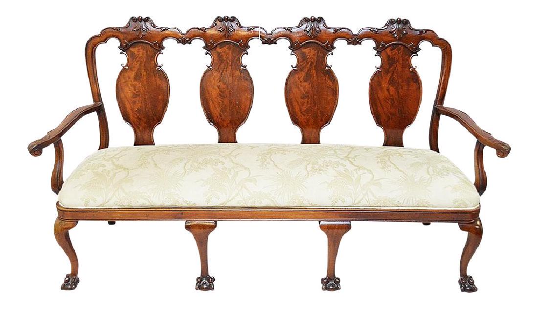 Antique Chippendale Settee: New to Jasper52 Title: Antique Chippendale Settee Additional Information: Fall in love with the classics with this 19th century Chippendale-style, hand-carved mahogany settee, serpentine arm with acan