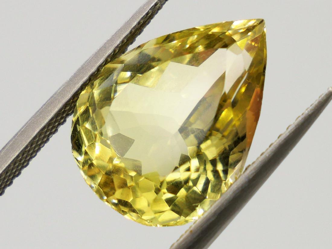 Lemon Quartz of 8.54 ct: No Reserve! Title: Lemon Quartz of 8.54 ct Color/Clarity: Yellow Gemstone Type: Lemon Quartz Carat Weights: 8.54 Size/Dimensions: 6.51 x 2.60 x 8.51 MM Additional Information: Fine Quality. Pear Mixed