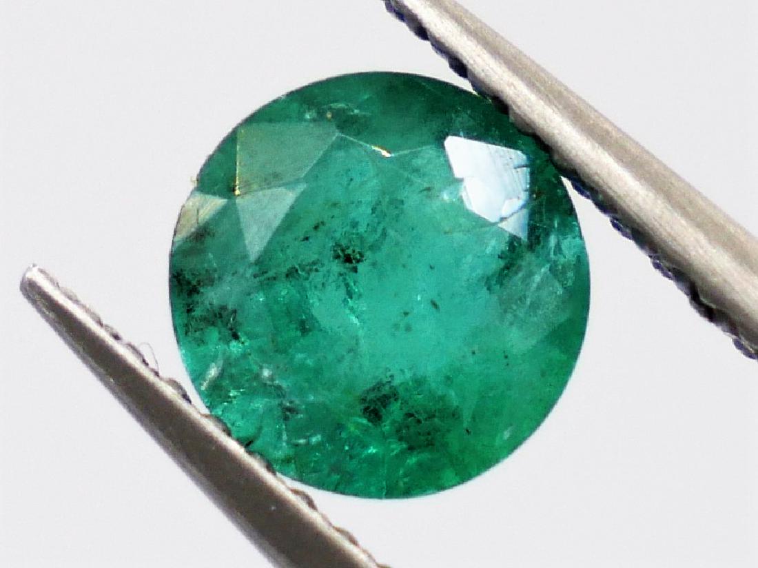Emerald of 0.94 ct **Vivid Green** (1 of 3)
