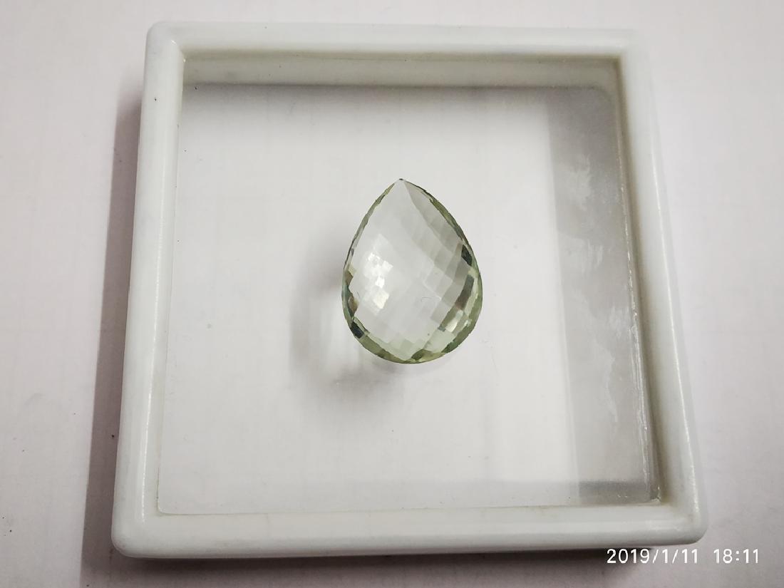 Natural Pear Checker Cut Lemon Topaz: Reserve Reduced! Title: Natural Pear Checker Cut Lemon Topaz Gemstones: Topaz Carat Weights: 21.55 Size/Dimensions: 23 x 15 x 12 Number of Pieces: 1 Reserve: $20.65 Jasper52 negotiates the lowest rese