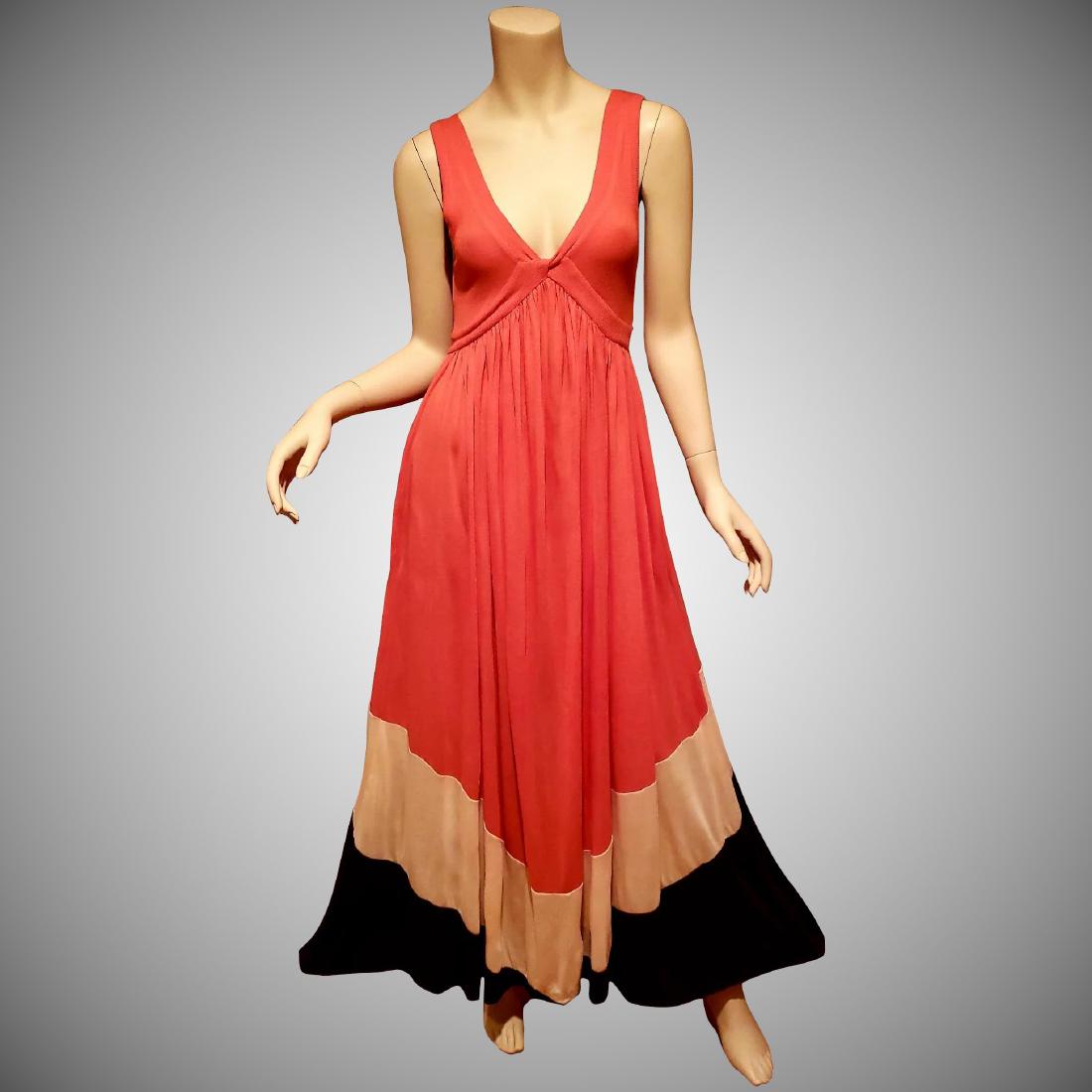 Vtg Diane von Furslenbrg kiwana color block maxi dress: Beautiful Designer dress Diane von Furstenbrg. Modal and silk rib knit detail,plunging neckline,two side pocket and very fluid. Size - S Bust-30-32" Waist-26-28" Hip-Free Has a stretch to it Shipping: