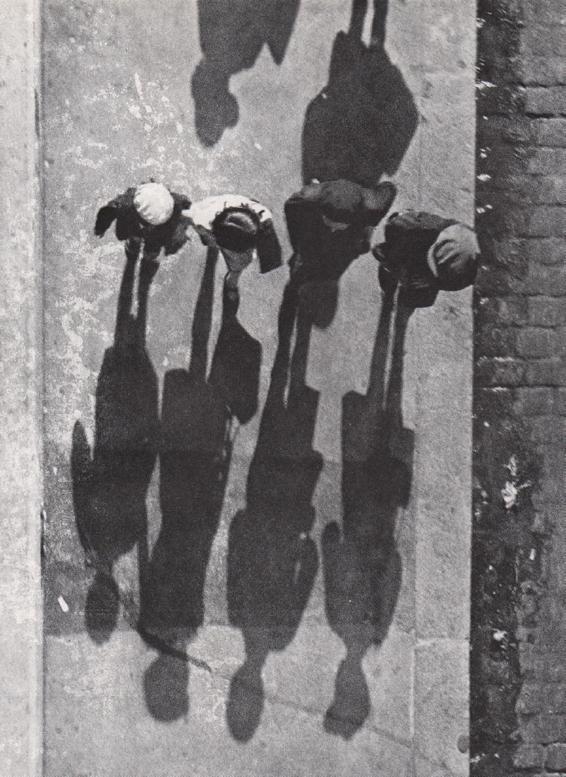 KERTESZ - Shadows, Paris,1931: Artist: KERTESZ Print Title: Shadows, Paris,1931 Medium: Photoengraving Printed 1970Â’s in the USA Image size (inches) approx. 8 x 6Â” Andre Kertesz (1894-1985) born Kertesz Andor, was a Hunga