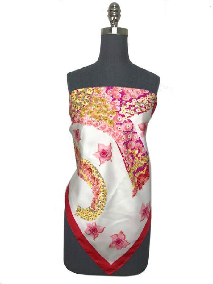 Salvatore Ferragamo Jumbo Elephant Print Silk Scarf: We guarantee the authenticity of this Salvatore Ferragamo Jumbo Elephant Print Silk Scarf. This stunning scarf features a large elephant graphic on a white background with pink and yellow florals. Con