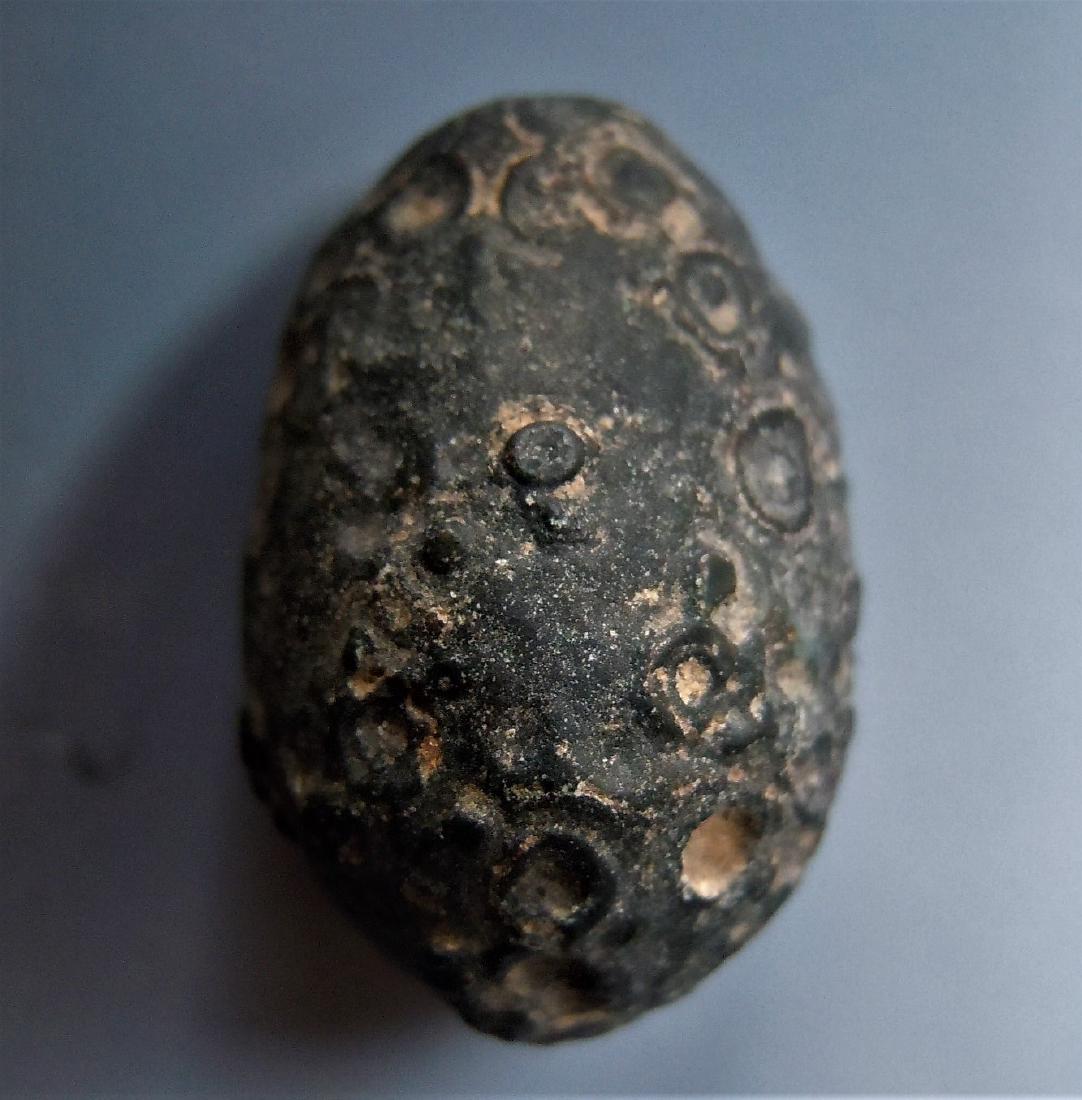 EYE AGATE - 100 % NATURAL: Title: EYE AGATE - 100 % NATURAL Origin: Alashan Area, Inner Mongolia, China Size: 1.8x1.2x1.1 cm / 3 gram Description: dark green eye agate with many concentrix structures Reserve: $3.00 Shipping: Do