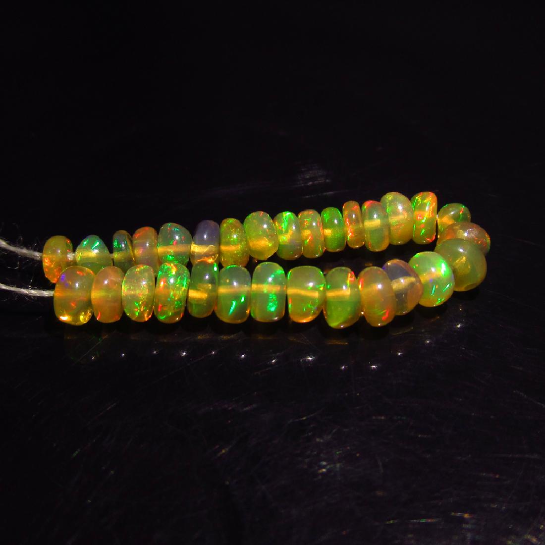 4.24 Ct Genuine 30 Drilled Multi-Color Fire Round Opal (1 of 2)