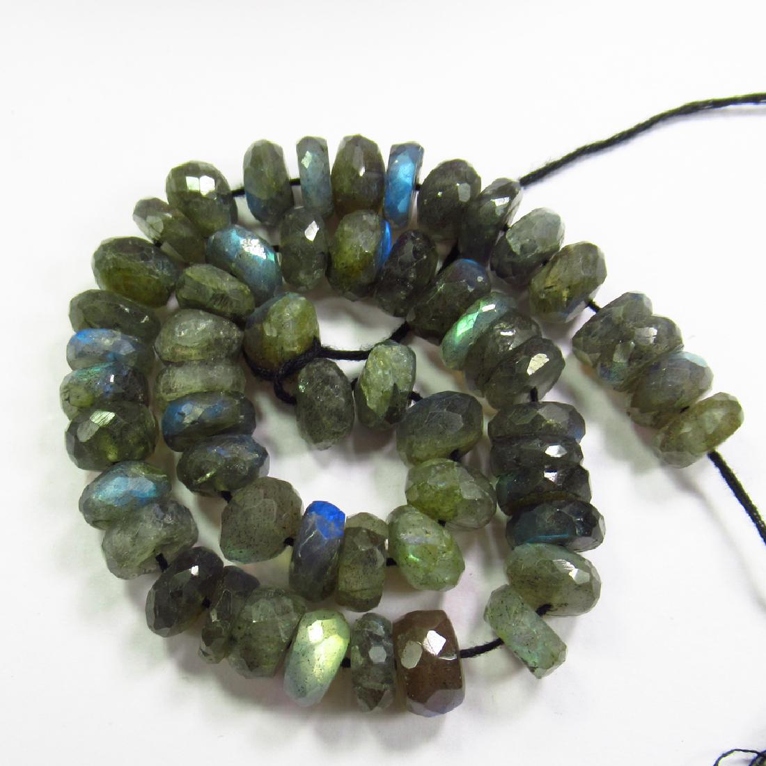 166.93 Ct Genuine 55 Drilled Round labradorite Beads: No Reserve! Title: 166.93 Ct Genuine 55 Drilled Round labradorite Beads Stone Clarity: SI Gemstones: Natural labradorite Beads Carat Weights: 166.93 Size/Dimensions: 8.50 to 9.20 mm / 55 PC's Addition