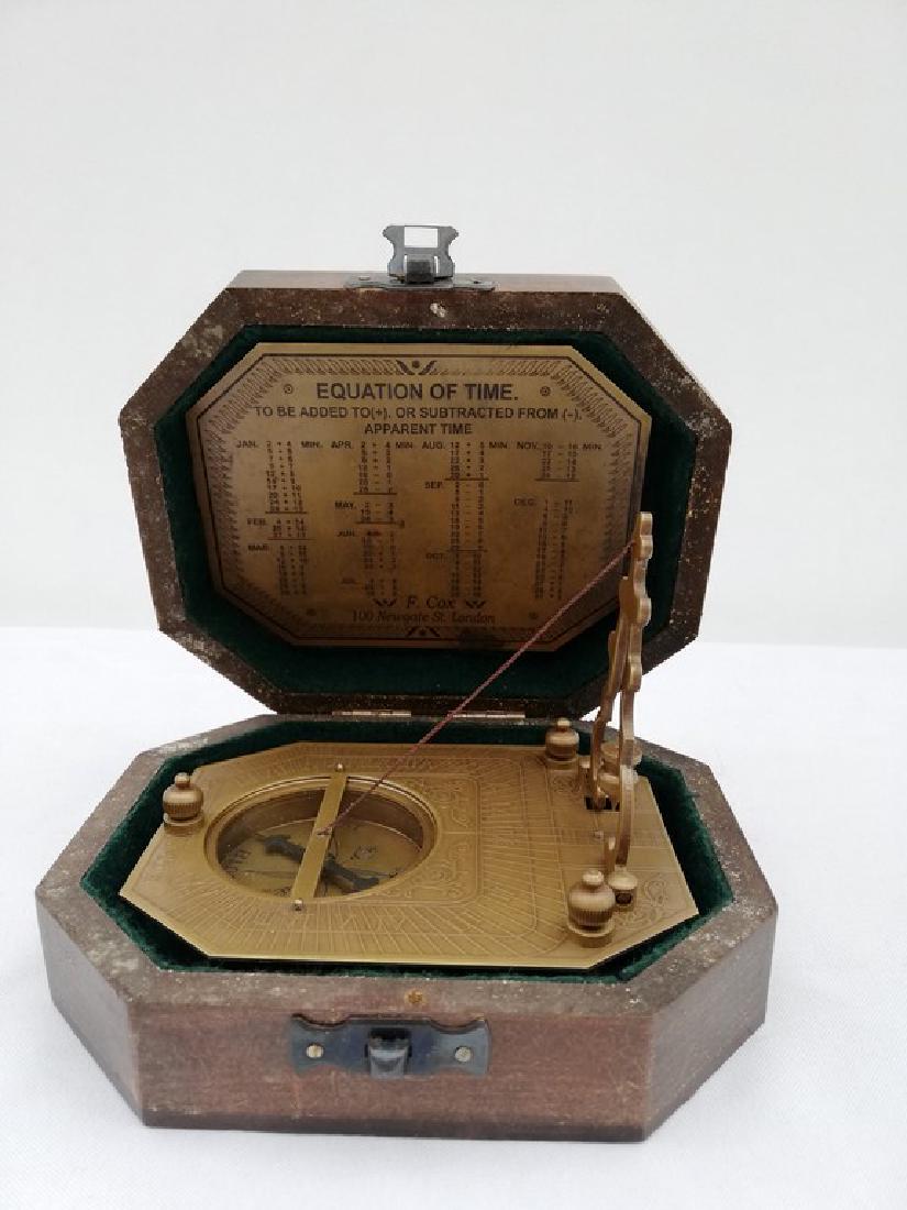 Vintage sundial compass in wooden box: Reserve Reduced! Title: Vintage sundial compass in wooden box Maker: unknown Origin: United Kingdom Date/Period: 1920 Materials: Wood, copper, Dimensions: Height: 15 cm / 6 inch Width: 16 cm / 6.4 inc