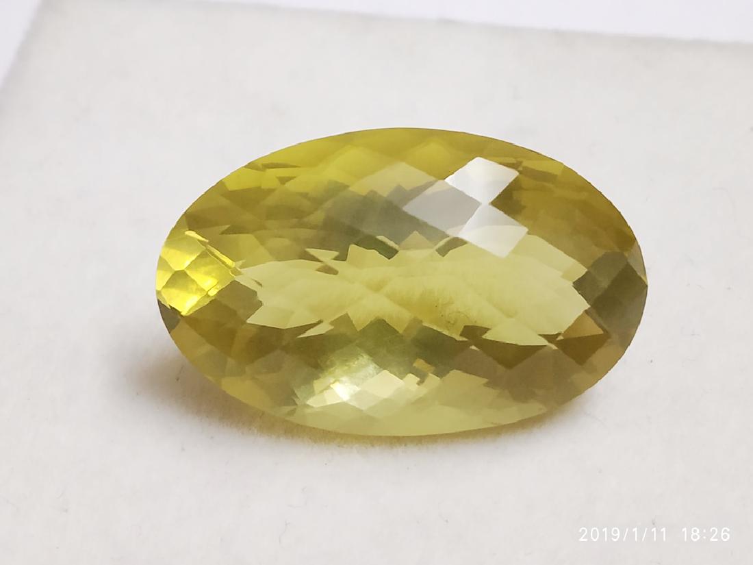 Natural Oval Checker Cut Lemon Topaz: Reserve Reduced! Title: Natural Oval Checker Cut Lemon Topaz Gemstones: Topaz Carat Weights: 29.88 Size/Dimensions: 26 x 16 x 13 Number of Pieces: 1 Reserve: $39.84 Jasper52 negotiates the lowest rese