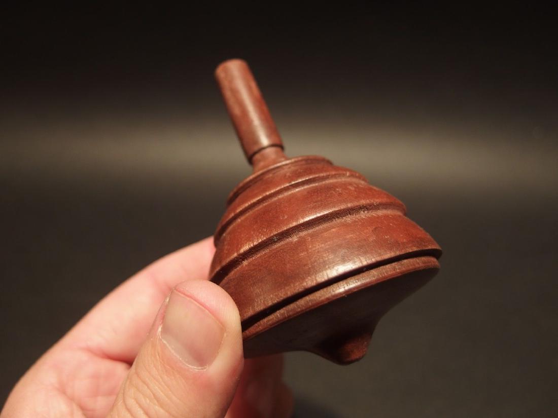Wood Spinning Top Toy: 4" Tall Such a neat reproduction antique turned wood spinning top. Tops such as this are among the simplest of old toys. The earliest tops like this were many times made by children for fun out of scr