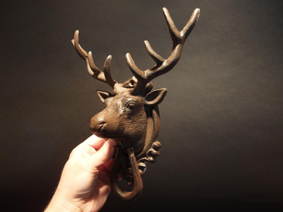 Cast Iron Deer Head Door Knocker Hardware: 10 1/2" Height x 9" Wide x 4" ExtensionGreat reproduction deer head door knocker cast from an antique. Nice heavy duty so you'll know when someone is knocking. It has a great authentic looking sturdy 
