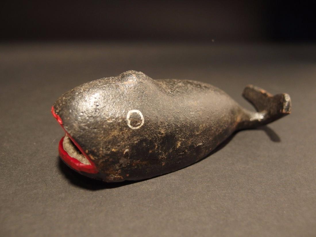 Cast Iron Whale Beer Soda Bottle Cap Opener: 5" Long x 1 3/4" Wide Great folk art cast iron bottle opener. This piece was hand painted and aged to look like an antique. Reserve: $10.00 Shipping: Domestic: Flat-rate of $10.00 to anywhere within t