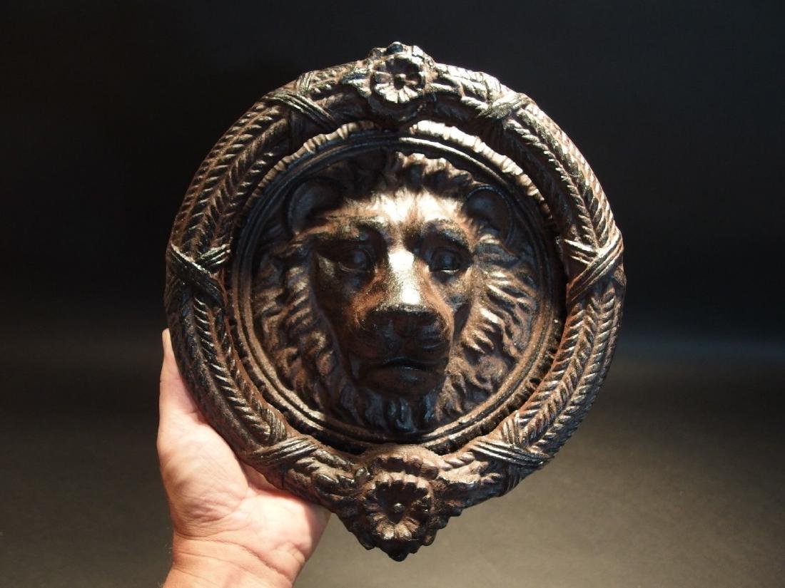 Cast Iron Lion Head Door Knocker Hardware: 11 1/2" Height x 10 1/4" Wide x 2 1/2" ExtensionGreat reproduction lion head door knocker cast from an antique. This piece weighs 8 lbs so you'll know when someone is knocking. It has a great authenti
