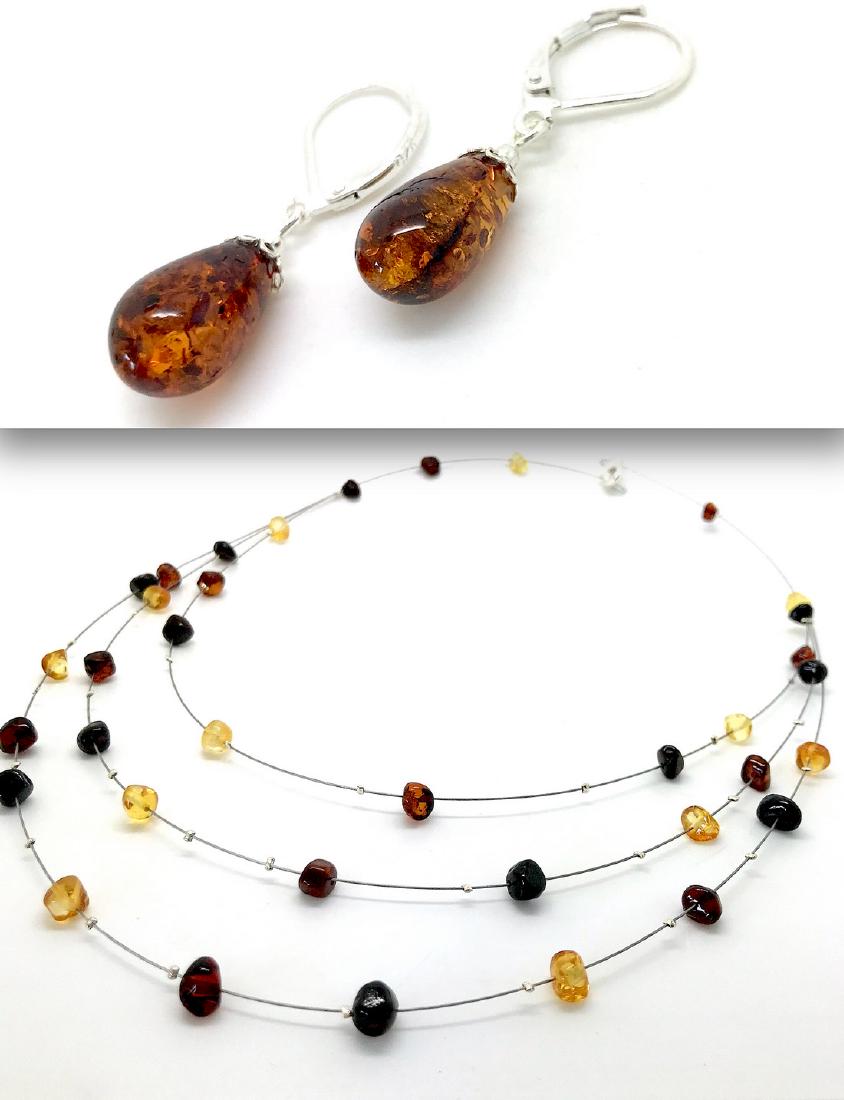 Delicate necklace earrings Baltic amber Sterling silver: Title: Delicate necklace earrings Baltic amber Sterling silver Metal: Sterling silver 925 Weight: 6.2 grams Size: length of the shortest line 44 cm, earrings 32x8mm amber colour: cherry, lemon and hon