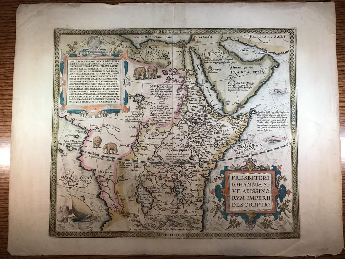 Ortelius: Presbiteri Iohannis (Prester John): No Reserve! Title/Content of Map: Presbiteri Iohannis (Prester John) Date: 1603 Cartographer: Abraham Ortelius Material/Medium: Old hand color, good impression. Latin text on verso. From the first mod