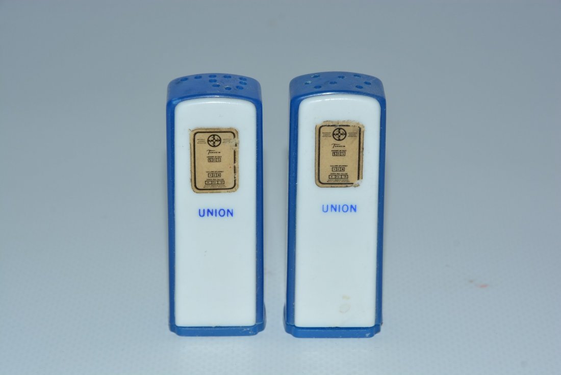 Union Plastic Gas Pump Salt & Pepper Shaker Set: No Reserve! rated 9, paper label meters have light wear, ink stamped lower, bodies are good with blue and white doors, one is ink stamped on back, 2.75"T. Shipping: Domestic: Flat-rate of $15.00 to an