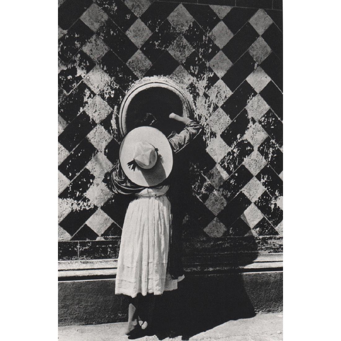 MANUEL ALVAREZ BRAVO - La Hija de los Danzantes, 1932: Artist: MANUEL ALVAREZ BRAVO Print Title: La Hija de los Danzantes, 1932 Medium: Sheet-fed Gravure Printing Date: 1970's Printed in Switzerland Image Size: 5 X 7.5 inches Manuel Alvarez Bravo (1902-20