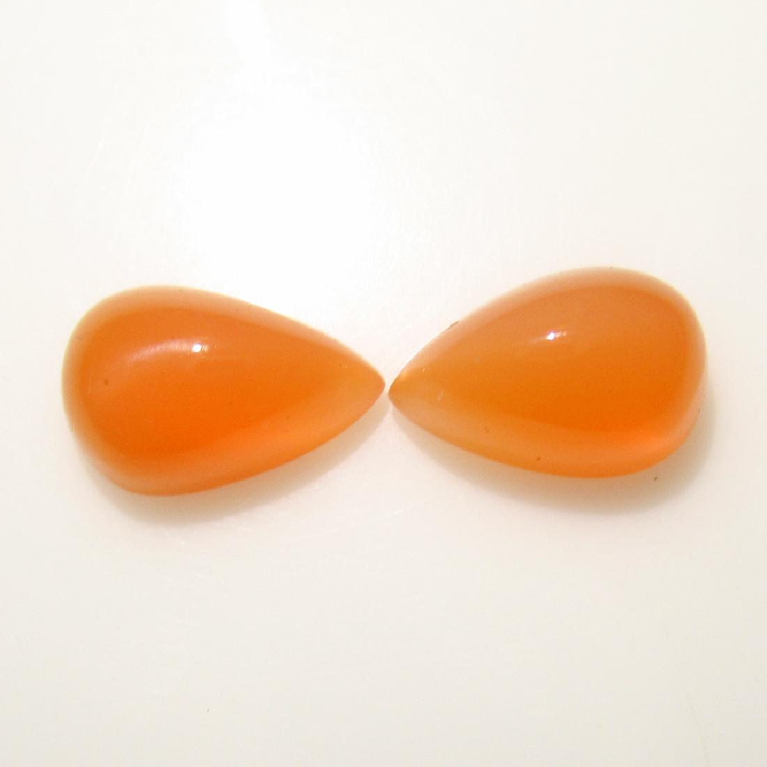 7.48 Ct Genuine Orange Moonstone Matching Pear Pair: No Reserve! Title: 7.48 Ct Genuine Orange Moonstone Matching Pear Pair Stone Clarity: Transparent Gemstones: Natural Moonstone Carat Weights: 7.48 Size/Dimensions: 12.10 x 8.00 x 6.50 mm / 2 PC's Addi