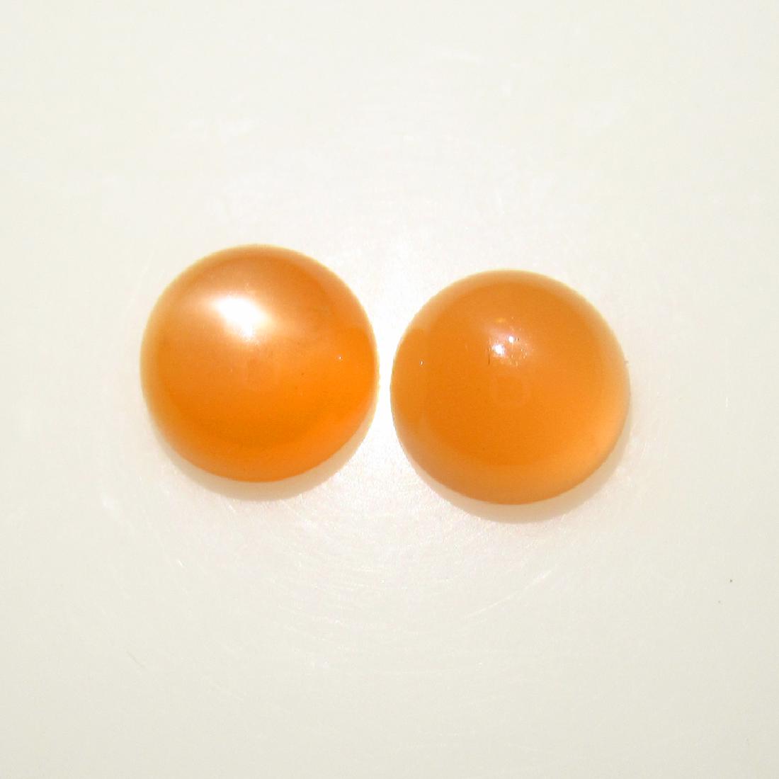 5.70 Ctw Natural Orange Moonstone 9 mm Round Pair: No Reserve! Title: 5.70 Ctw Natural Orange Moonstone 9 mm Round Pair Stone Clarity: Transparent Gemstones: Natural Moonstone Carat Weights: 5.70 Size/Dimensions: 9.10 x 9.10 x 5.00 mm / 2 PC's Additio