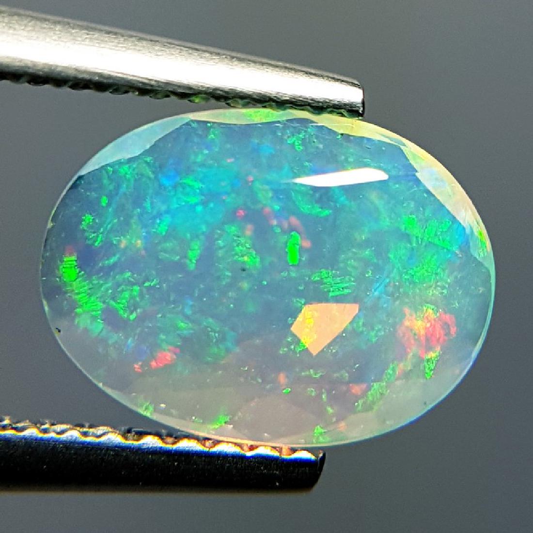 1.10 ct Multi Color Fire Oval Cut Natural Opal (1 of 10)