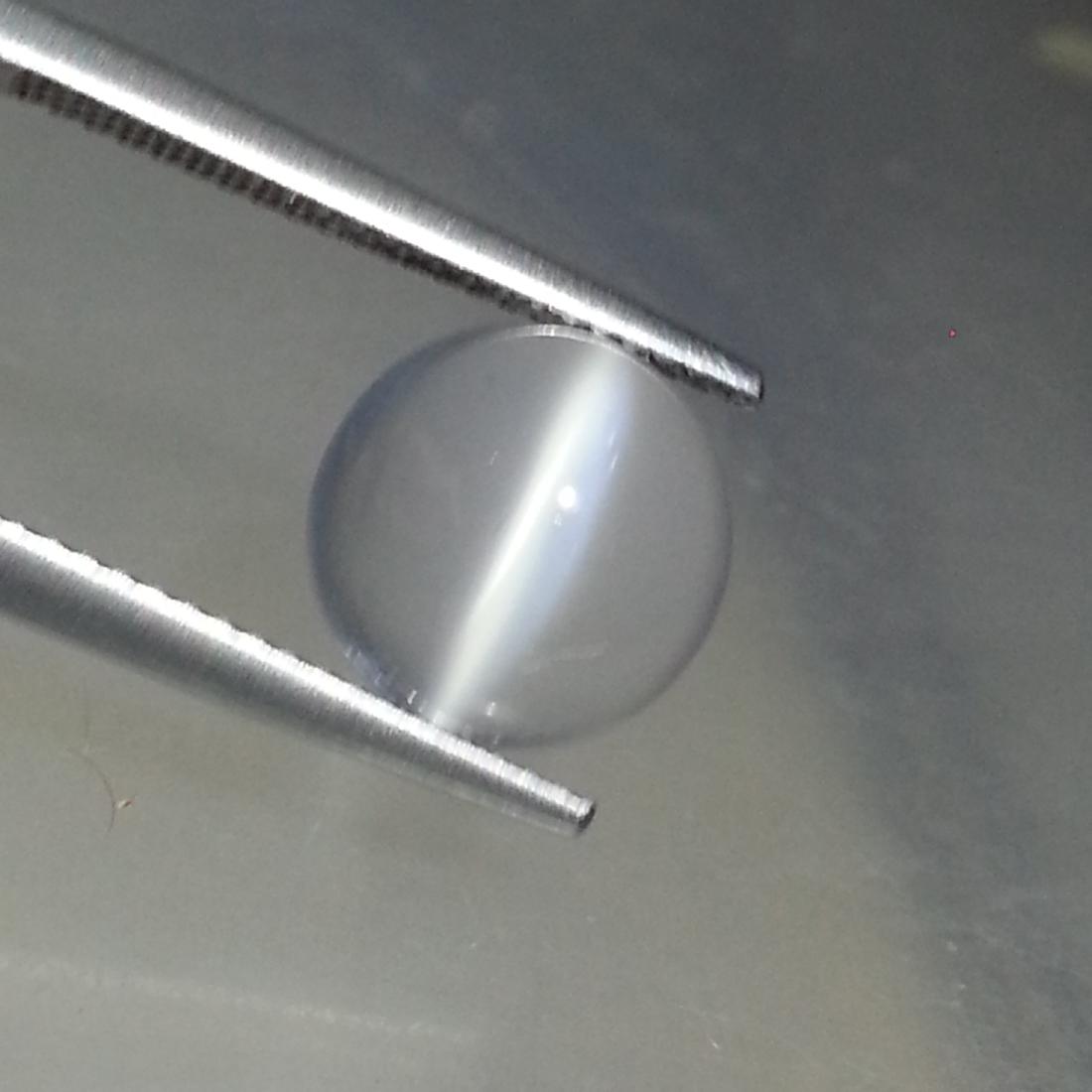 Fantastic Natural Moonstone Cat's Eye- 3.63 ct: No Reserve! Title: Fantastic Natural Moonstone Cat's Eye- 3.63 ct Color/Clarity: VVS Gemstones: Loosegemstone Carat Weights: 3.63 Size/Dimensions: 10.00 x 10.00 x 4.89 Additional Information: Round - 