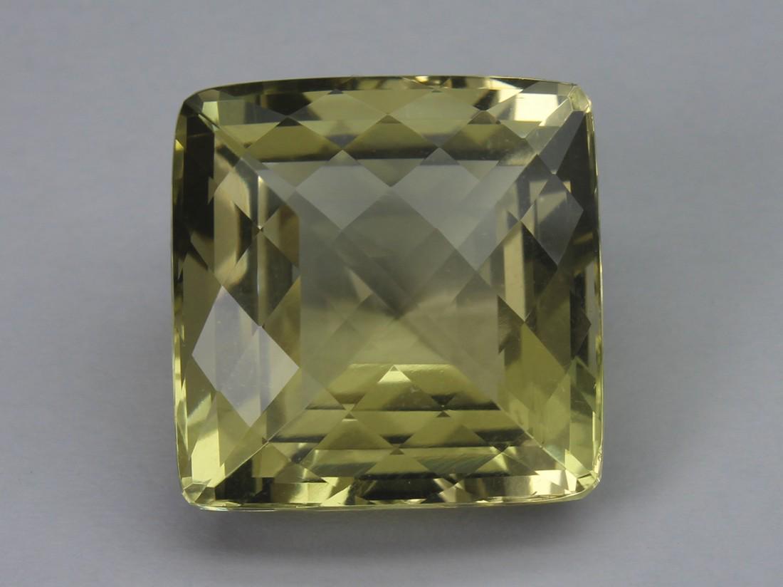 19.72 Cts Natural Lemon Quartz: No Reserve! Title: 19.72 Cts Natural Lemon Quartz Additional Information: Gemstone : Lemon Quartz Weight : 19.72 Cts Shape : Square Cushion Cut Colour : Greenish Yellow Dimensions : 16.2x16.1x10.9 mm 