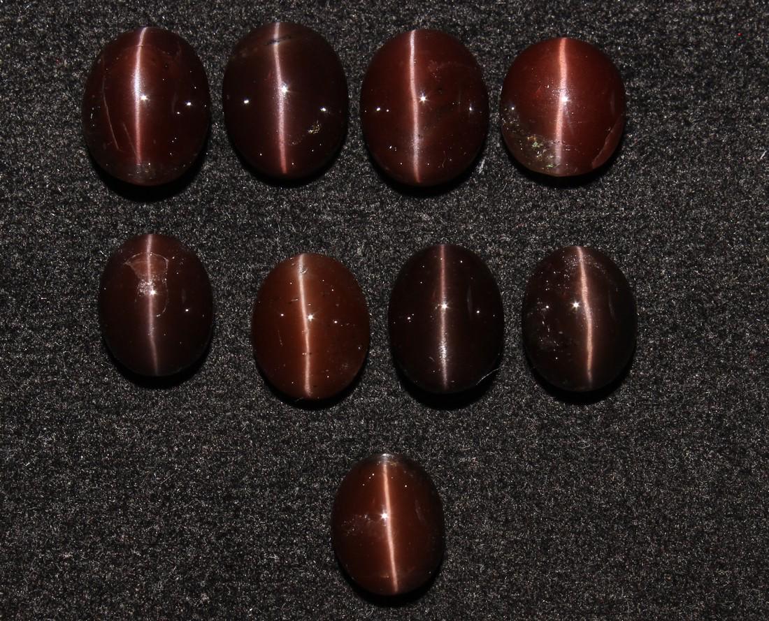 36.10 Ct Natural Scapolite Cat's Eye Lot: No Reserve! Title: 36.10 Ct Natural Scapolite Cat's Eye Lot Additional Information: Gemstone : Natural Cat's-Eye Scapolite Origin: Madagascar Weight: 36.10 Carats Dimensions: 9.4x7.5x5.4 mm to 10.9x8.