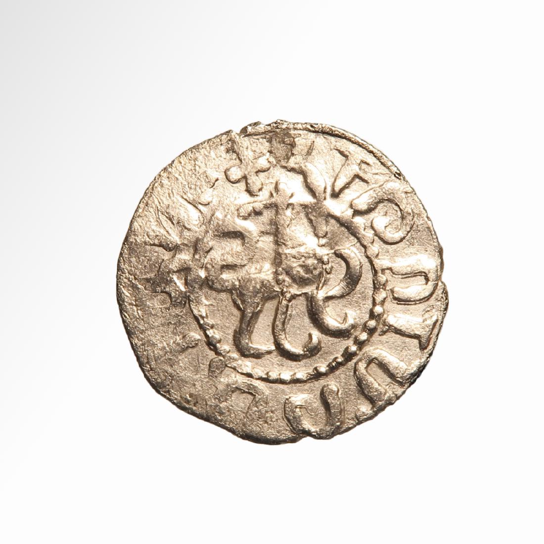 Medieval Crusaders Armenian Silver Tram, King Hetoum I: Date & Origin: Armenia, 1226-1270 A.D. Descripription: Medieval Silver Tram of Hetoum I and Zabel, Armenia, 1226-1270 A.D. Material: Silver, 2.8 grms Dimension: 2.1 cm D - 13/16 inch Reserve: $80.00 S