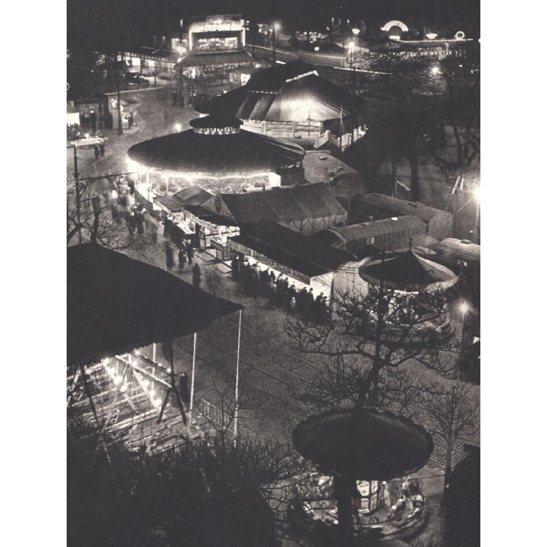 BRASSAI - A Fair in Paris: Artist: BRASSAI Print Title: A Fair in Paris Medium: Sheet-fed Gravure Printing Date: 1980's Printed in France Image size approx. 7.25 X 9.5 inches Brassai was a Hungarian–French photographer, sculp