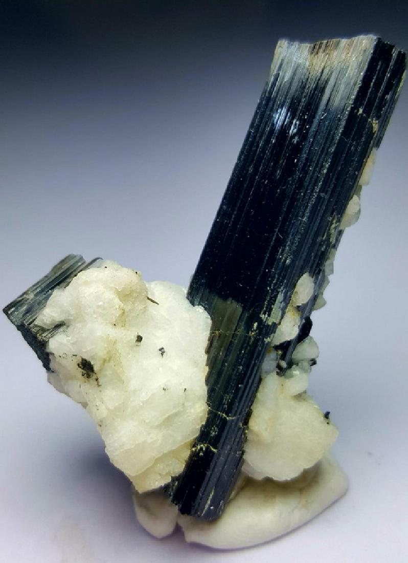 18.69 grams SUPREME QUALITY BLACK TOURMALINE TERMINATED: Title: 18.69 grams SUPREME QUALITY BLACK TOURMALINE TERMINATED CRYSTALS WITH ALBITE Origin: PAKISTAN Weight: 18 GRAMS Description: 18.69 grams SUPREME QUALITY BLACK TOURMALINE TERMINATED CRYSTALS WITH