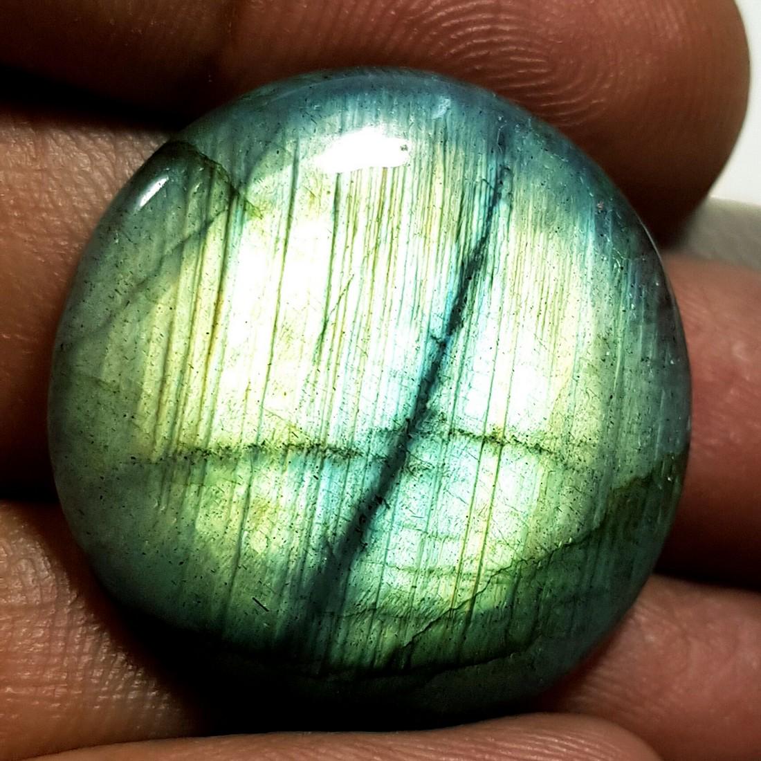 26.29 ct Natural Labradorite: No Reserve! Title: 26.29 ct Natural Labradorite Color/Clarity: Opaque Gemstones: Gemstones Carat Weights: $26 Size/Dimensions: 25.60 x 25.60 x 5.00 Additional Information: Round - USA Shipping:<