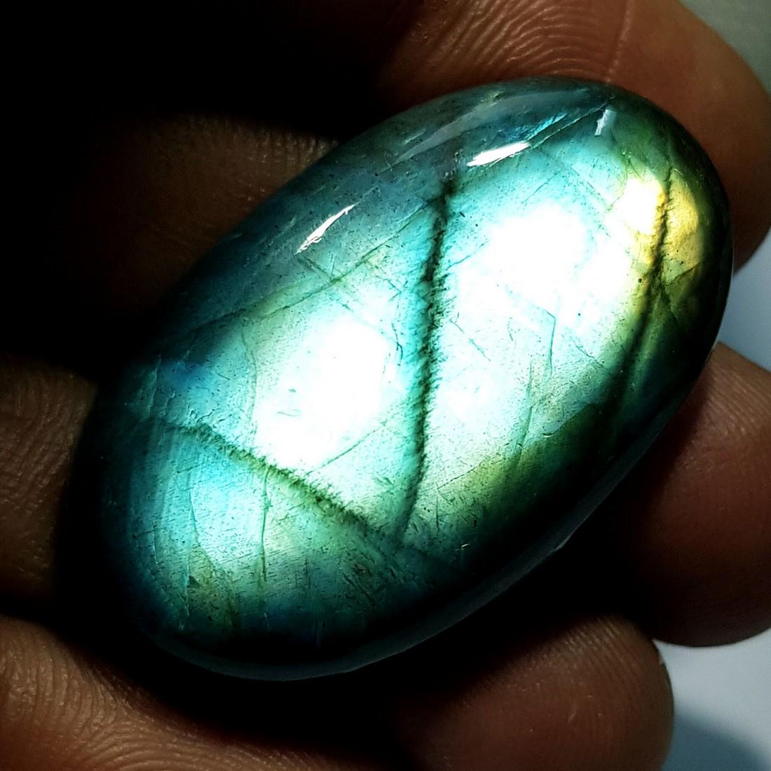 57.04 ct Natural Labradorite: No Reserve! Title: 57.04 ct Natural Labradorite Color/Clarity: Opaque Gemstones: Gemstones Carat Weights: $57 Size/Dimensions: 36.85 x 22.10 x 8.55 Additional Information: Oval - USA Shipping: