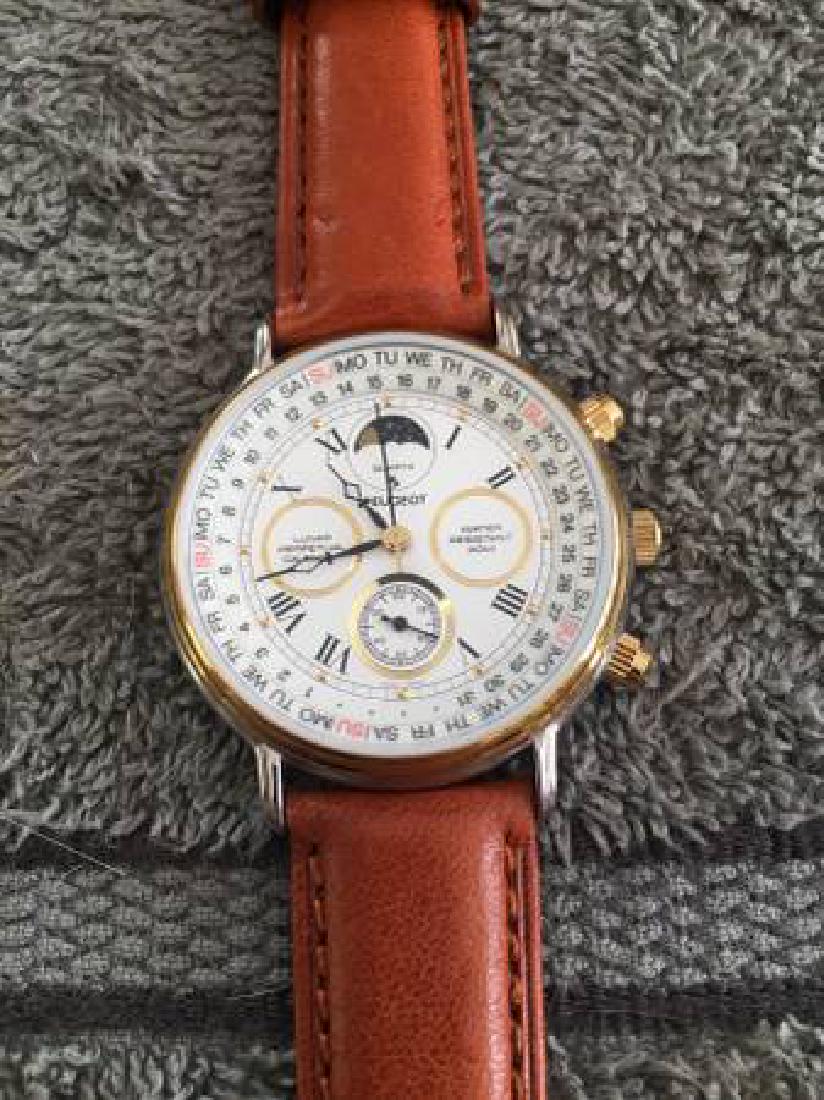 PEUGEOT VINTAGE MULTI-FUNCTION WATCH,PERPETUAL CALENDAR: Brand new and never worn. Original plastic covering on reverse of face. Great looking watch, running perfectly. Reserve: $120.00 Shipping: Domestic: Flat-rate of $8.00 to anywhere within the contiguou