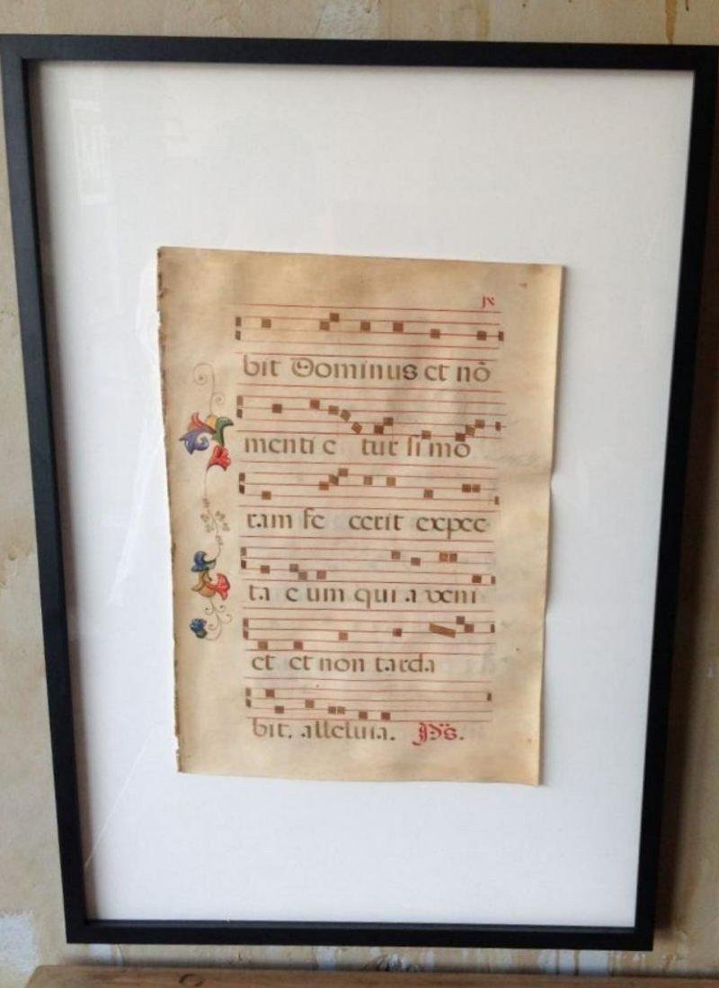 17th Century Sacred Music On Parchment: A gorgeous 17th Century antiphonal of chants for Mass. This framed Italian antique manuscript (in Latin) is an individual page of what would have been a large bound missal for a Catholic mass. Tempera