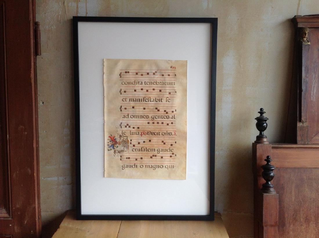 Antique Sacred Music On Parchment: A gorgeous 17th Century antiphonal of chants for Mass. This framed Italian antique manuscript (in Latin) is an individual page of what would have been a large bound missal for a Catholic mass. Tempera