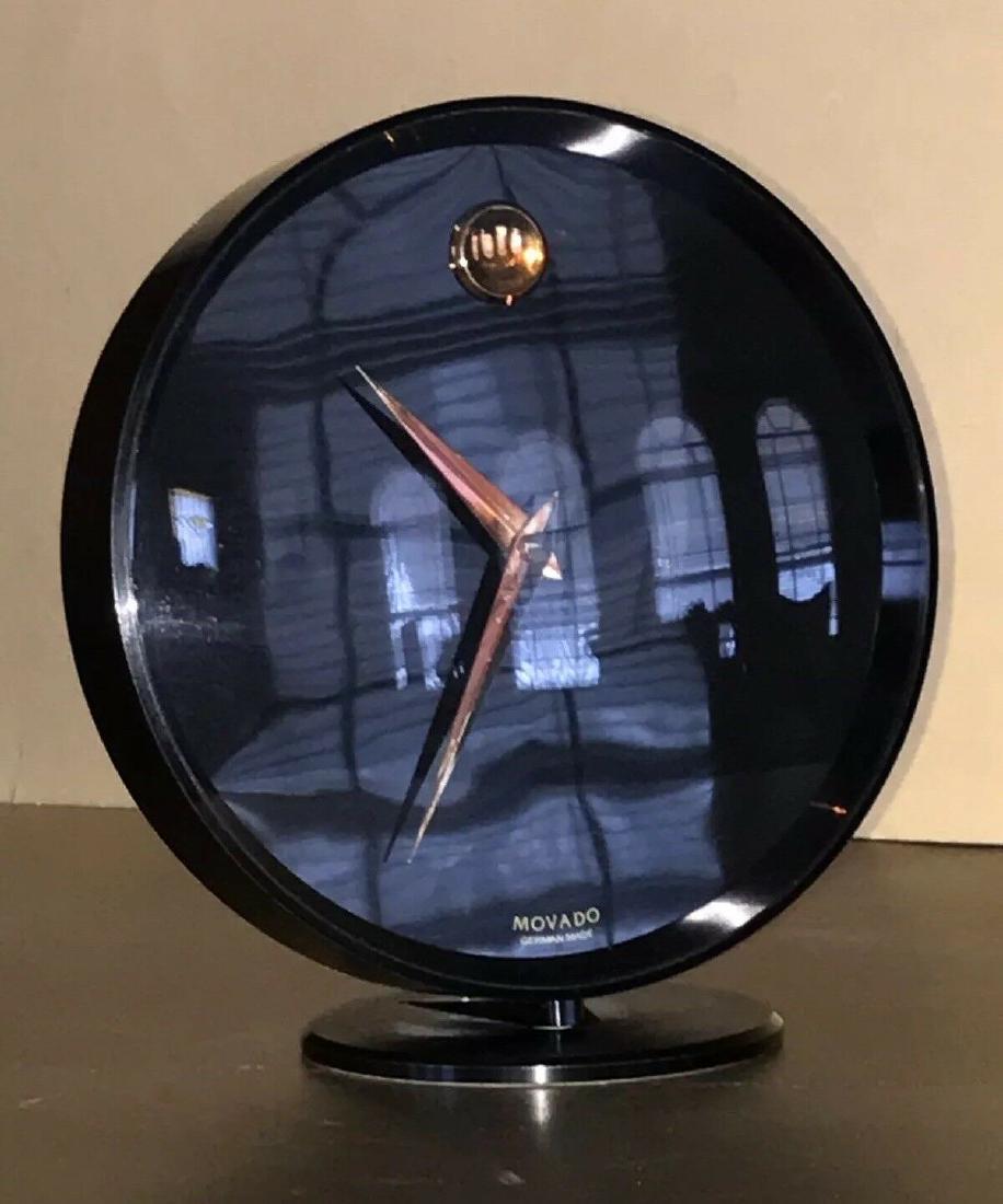 Estate Movado Howard Miller Design Black Slender Sleek: Estate Movado Howard Miller Design Black Slender Sleek Quartz Desk Clock An estate find.. In well working condition.. Battery will be removed before shipping... Black Slender.. standing 6 3/8” tall.
