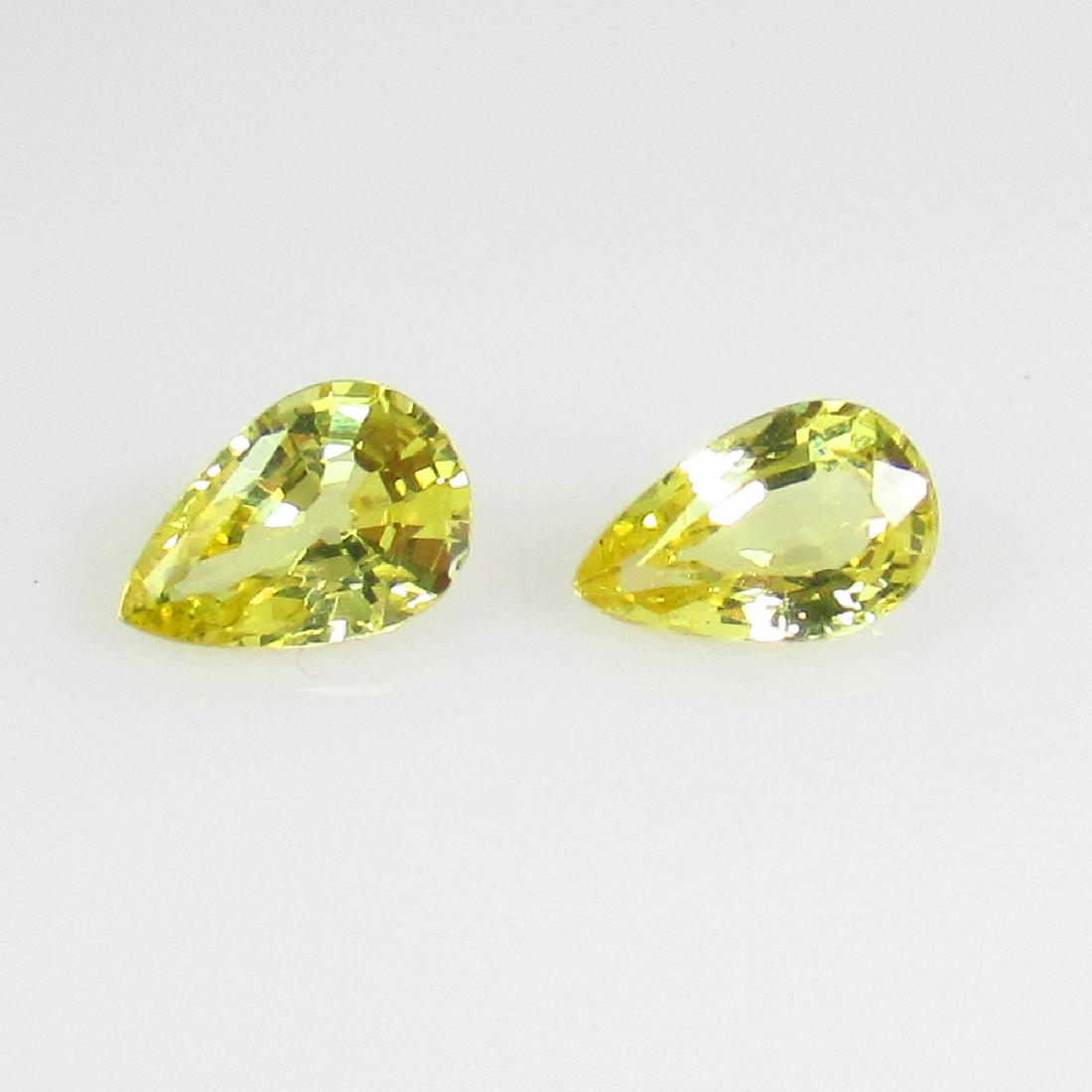 0.74 Ct Genuine Ceylon Yellow Sapphire Pear Pair: No Reserve! Title: 0.74 Ct Genuine Ceylon Yellow Sapphire Pear Pair Stone Clarity: VVS Gemstones: Natural Yellow Sapphire Carat Weights: 0.74 Size/Dimensions: 5.70 x 3.90 x 2.40 mm / 2 PC's Additional
