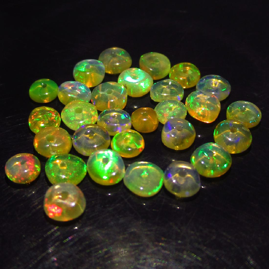 3.81 Ct Genuine 29 Drilled Multi-Color Fire Round Opal (1 of 2)