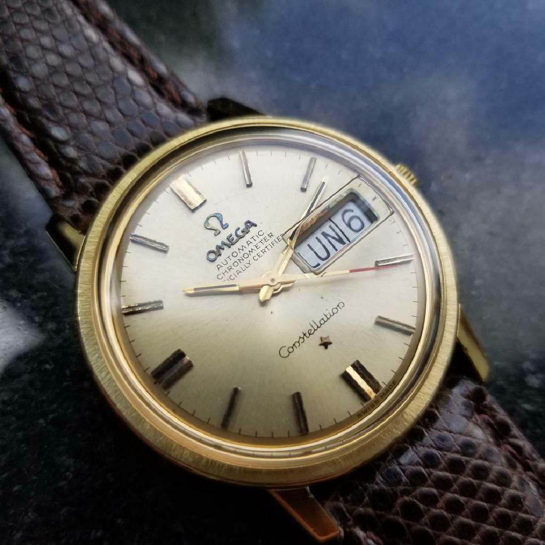 OMEGA Men's 18K Solid Gold Constellation w/DAY Date: Timeless elegance, men's 18K solid gold Omega Constellation day date automatic, c.1968. Verified authentic by a master watchmaker. Beautiful Omega gold dial, applied gold baton hour markers, day date 