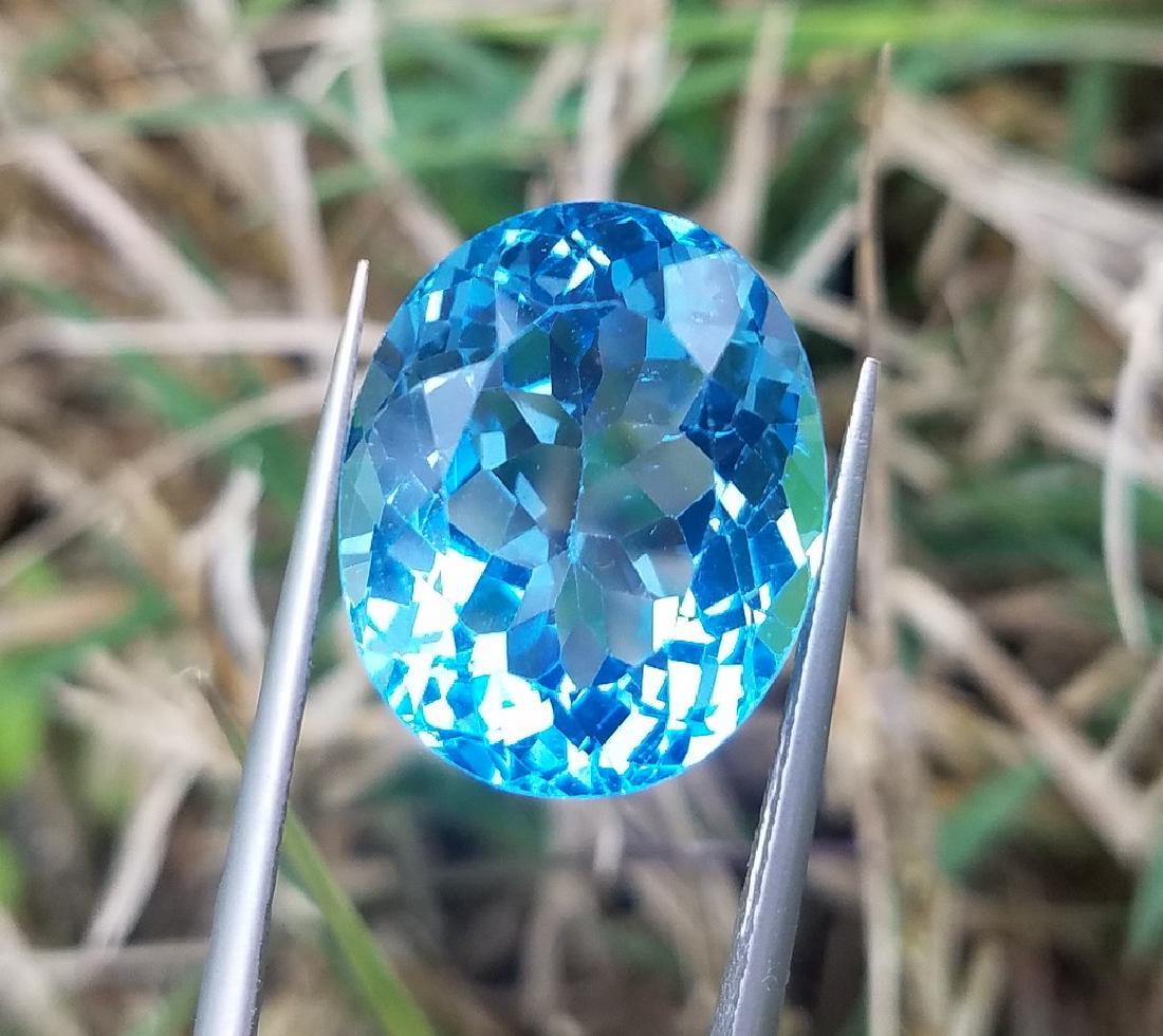 15.6 Carats Beautiful Blu Topaz Gemstone: Reserve Reduced! Title: 15.6 Carats Beautiful Blu Topaz Gemstone Origin: Swis Gemstones: Topaz Carat Weights: 15.6 Carats Size/Dimensions: 16*13*9 MM Additional Information: Natural Reserve: $50.00<