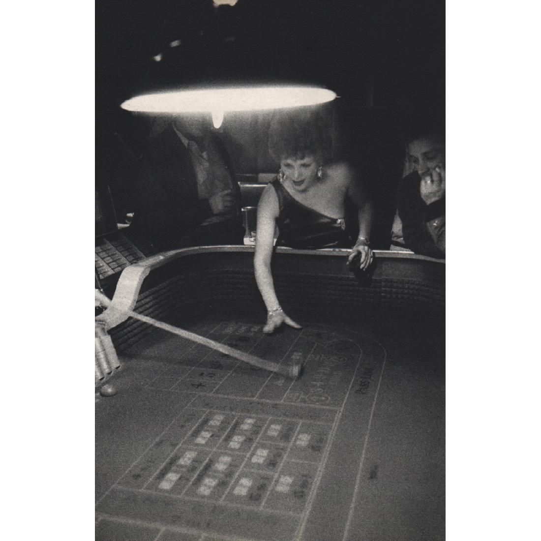 ROBERT FRANK - Elko, Nevada: Artist: ROBERT FRANK Print Title: Elko, Nevada Medium: Sheet-fed Gravure Printing Date: 1950's Printed in France Image Size approx: 4.5 x 6.75 inches Robert Frank (b. 1924) is an American photographer