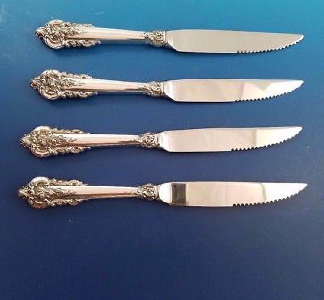 4 Grande Baroque Sterling Steak Knives: Reserve Reduced! Title: 4 Grande Baroque Sterling Steak Knives Wallace Silver Purity: 0.925 Size: 8 1/2" Set of 4 Custom Made Grande Baroque by Wallace Sterling Silver Steak Knives. Measures 8 1/2". T