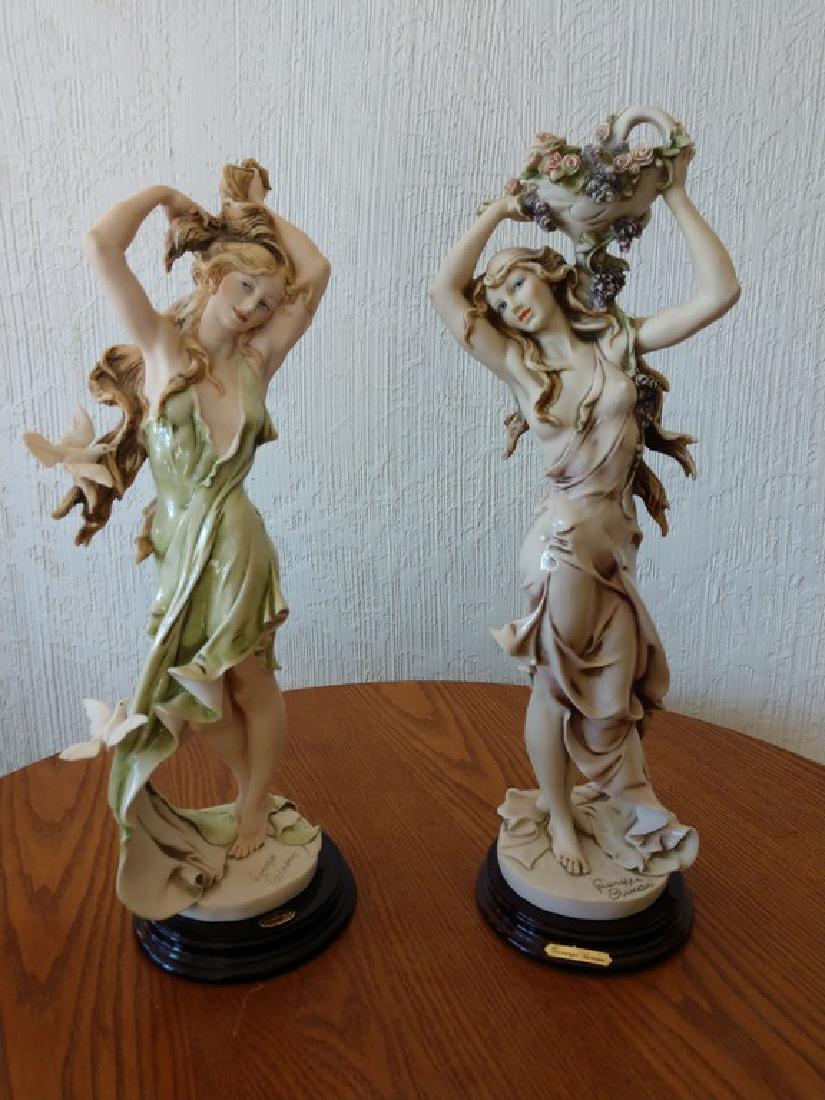 Pair of porcelains by Giuseppe Armani: Reserve Reduced! New to Jasper52 Title: Pair of porcelains by Giuseppe Armani Date/Period: Late 20th Century Materials: Porcelain Dimensions: 16 1/2" t x 5 3/4" w per statue Additional Information: Pa