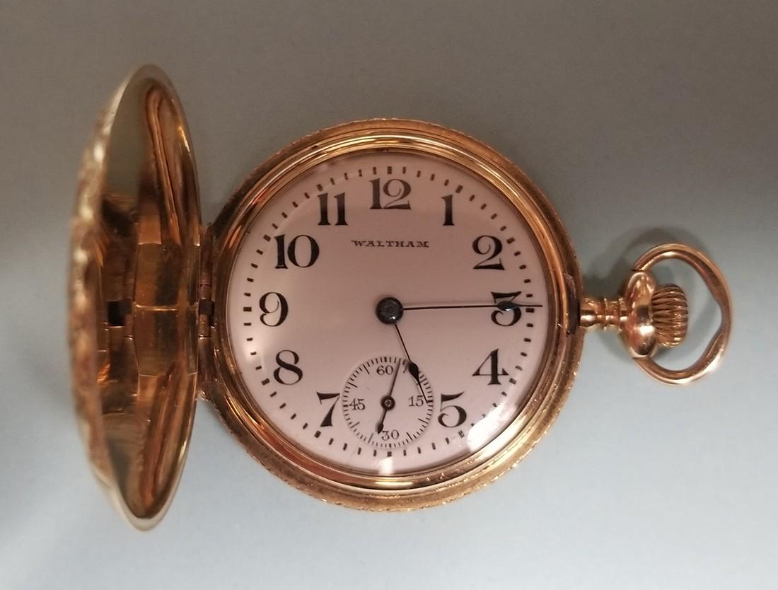 14K gold Waltham Hunting Case Ladies Watch size 8/0: Title: 14K gold Waltham Hunting Case Ladies Watch size 8/0 Dimension: 23.6 G total weight. Provenance:Currently in good running condition, beautifully engraved and decorated case. Shipping: Domestic: