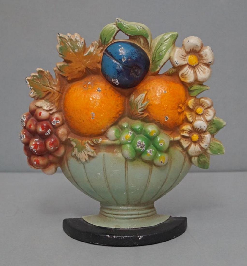 Fruit Bowl & Flowers Cast Iron Hubley Doorstop: Title: Fruit Bowl & Flowers Cast Iron Hubley Doorstop Date: Circa 1930's. Dimensions: 7" H. x 7" W. Additional Information: A Bright and Colorful Antique Cast Iron Assorted Fruit in Bowl Doorstop. Mad