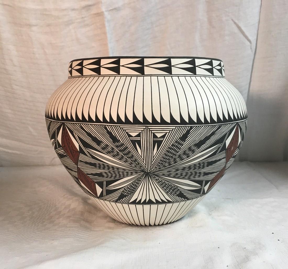 Grace Chino Signed Acoma N.W. Large Pottery Vessel: Title: Grace Chino Signed Acoma N.W. Large Pottery Vessel Date: 1970 Dimensions: 9" t/ 11" dia Additional Information: Grace Chino 1929-1994 Shipping: Domestic: Flat-rate of $45.00 to anywhere within 