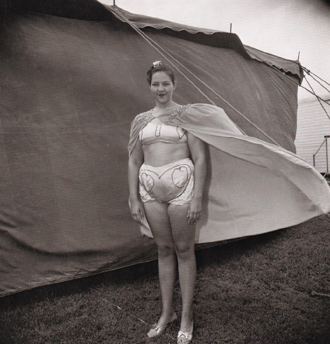 DIANE ARBUS - Girl in her circus costume, MD, 1970: Artist: DIANE ARBUS Print Title: Girl in her circus costume, MD, 1970 Medium: Photoengraving Printed 1970’s in the US Image size (inches) approx. 8.5 x 8” Diane Arbus (1923 –1971),was an America