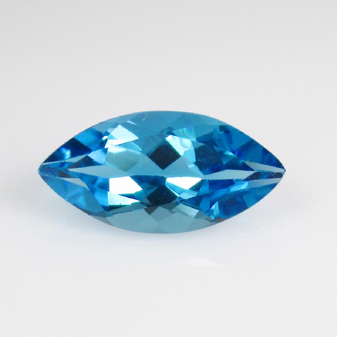 3.30 Ct Genuine Swiss Blue Topaz 14X7 mm Marquise Cut: No Reserve! Title: 3.30 Ct Genuine Swiss Blue Topaz 14X7 mm Marquise Cut Stone Clarity: VVS Gemstones: Natural Blue Topaz Carat Weights: 3.3 Size/Dimensions: 14.10 x 7 .10 x 5.10 mm Additional Informa