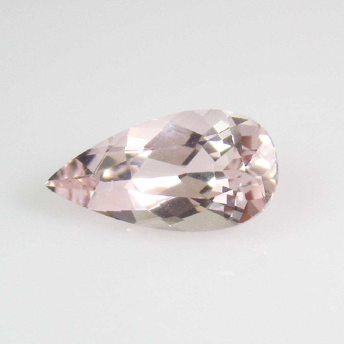 1.88 Ct Genuine Fine Pink Morganite Pear Cut: No Reserve! Title: 1.88 Ct Genuine Fine Pink Morganite Pear Cut Stone Clarity: VVS Gemstones: Natural Morganite Carat Weights: 1.88 Size/Dimensions: 11.70 x 6.20 x 4.8/0 mm Additional Information: Pin